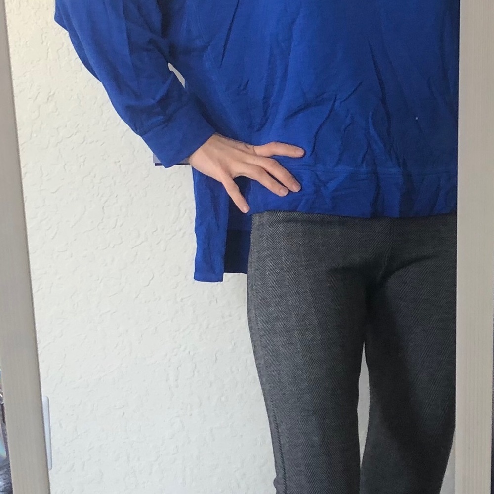 Blue sweater and gray leggings